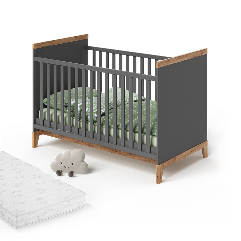 Babybett in Grau/Artisan auf weißem Hintergrund mit dekorativen Elementen