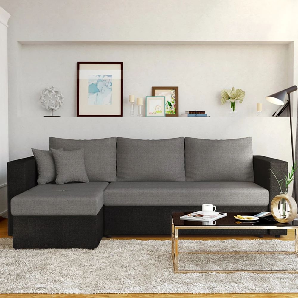 Sofa L Form in Grau, dargestellt im Ambiente mit Dekoration