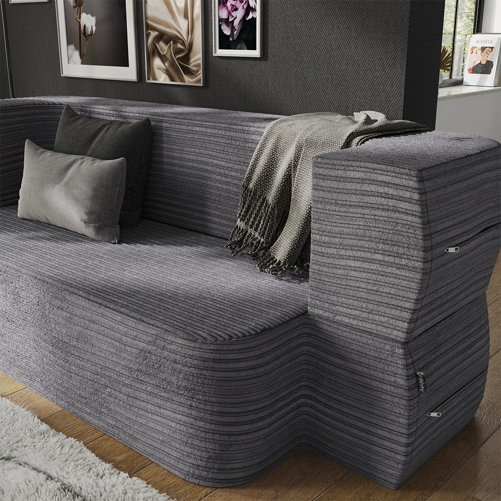 Nahaufnahme von Sofa in Grau, zeigt Textur/Details