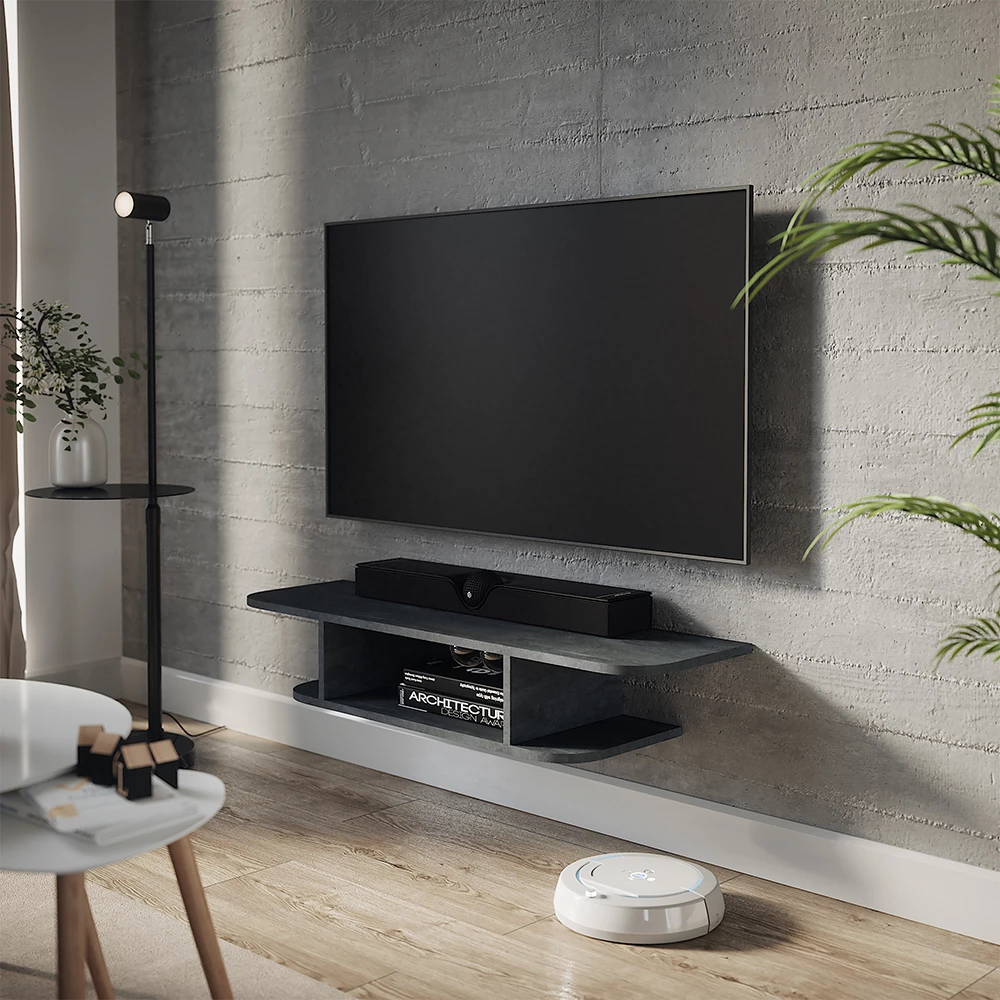 Tv-Schrank in Schwarz Beton, dargestellt im Ambiente mit Dekoration