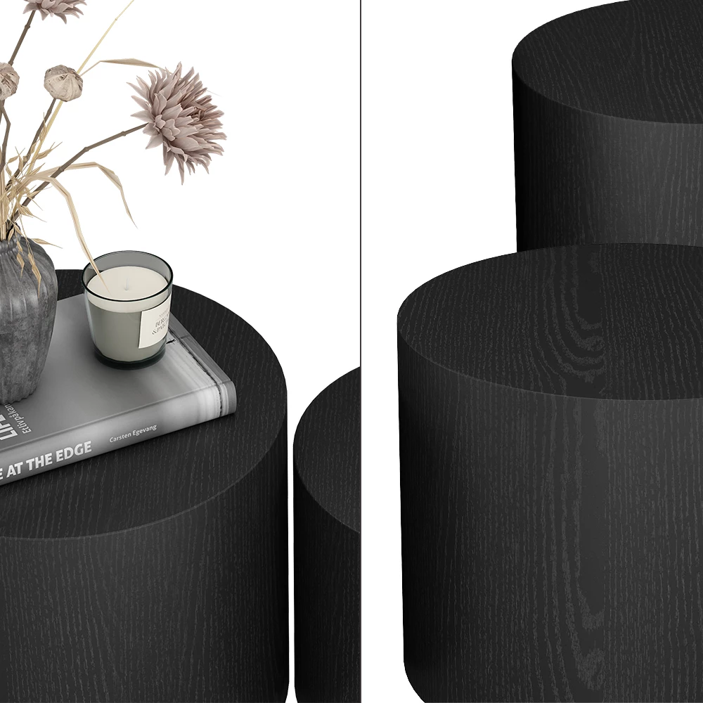Nahaufnahme von Couchtisch-Set in Schwarz, zeigt Design- und Oberflächendetails