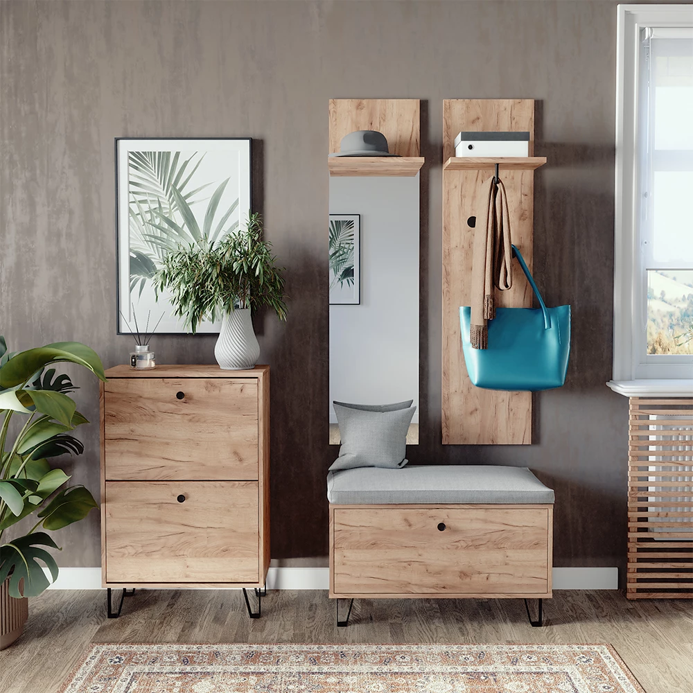 Garderobenset in Goldkraft Eiche, dargestellt im Ambiente mit Dekoration