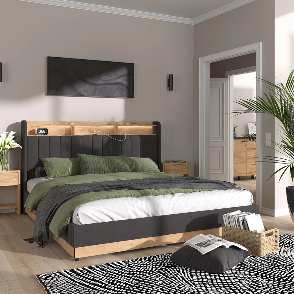 Polsterbett in Anthrazit, dargestellt im Ambiente mit Dekoration