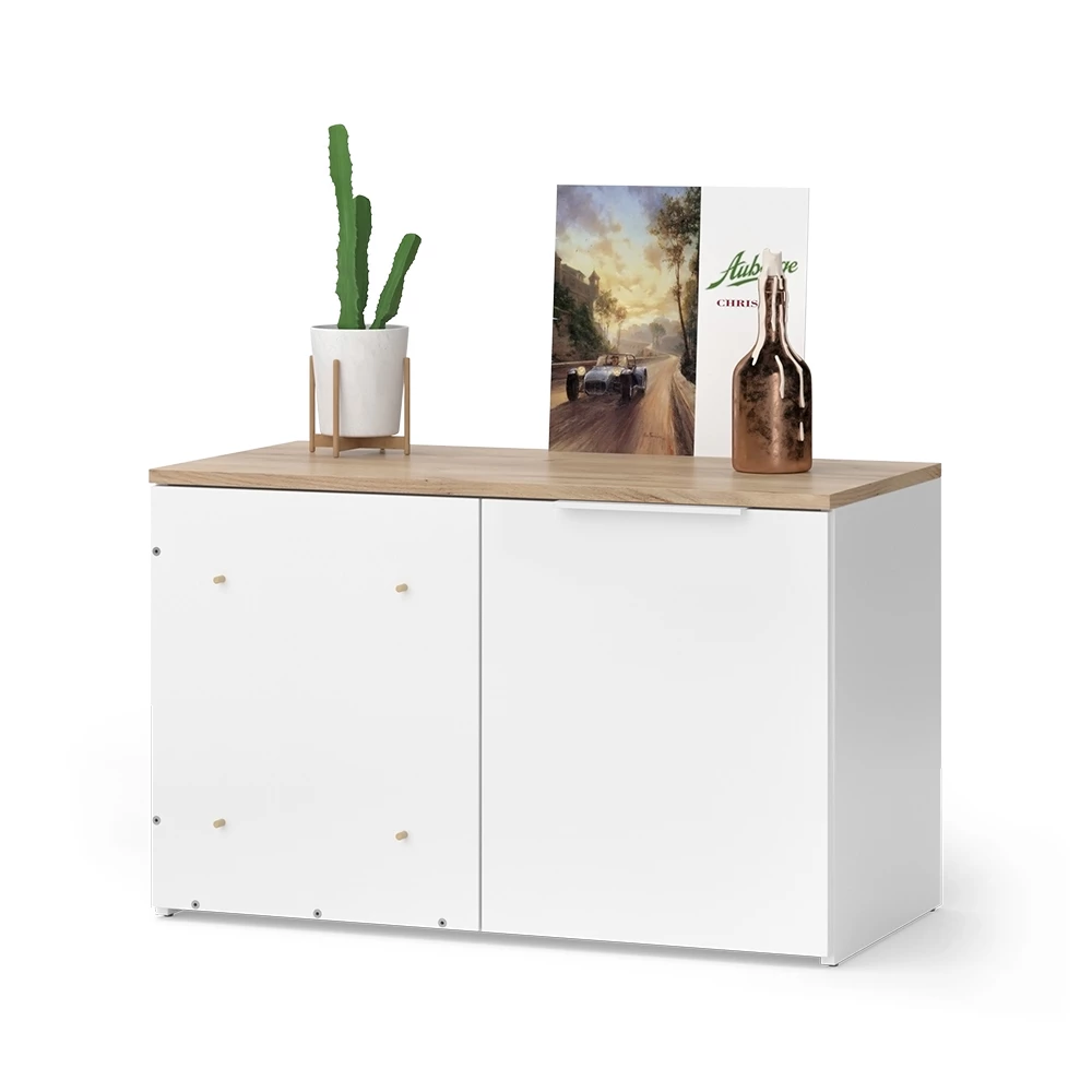 Eckkommode in Weiß/Sonoma auf weißem Hintergrund mit dekorativen Elementen