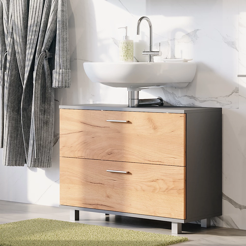 Waschbeckenunterschrank in Goldkraft Eiche/Anthrazit, dargestellt im Ambiente mit Dekoration