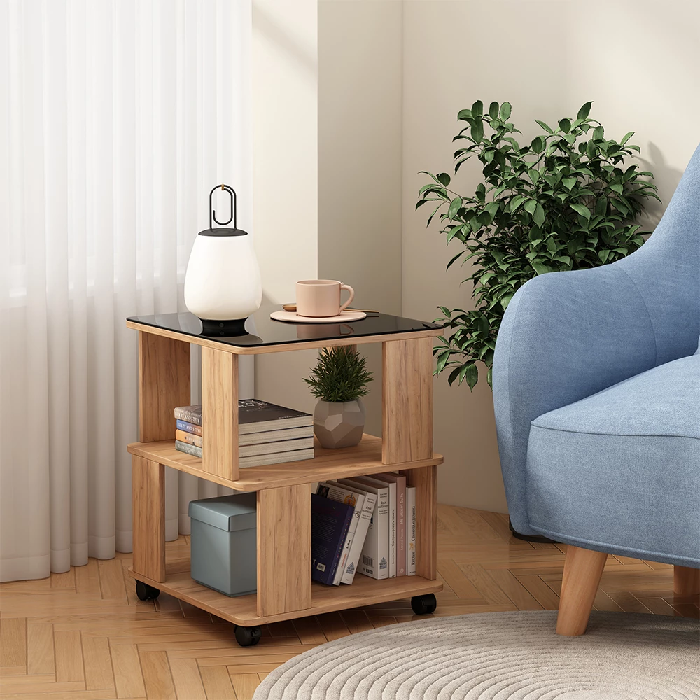 Sofabord i farven Goldkraft eg/sort på hvid baggrund med dekorative elementer