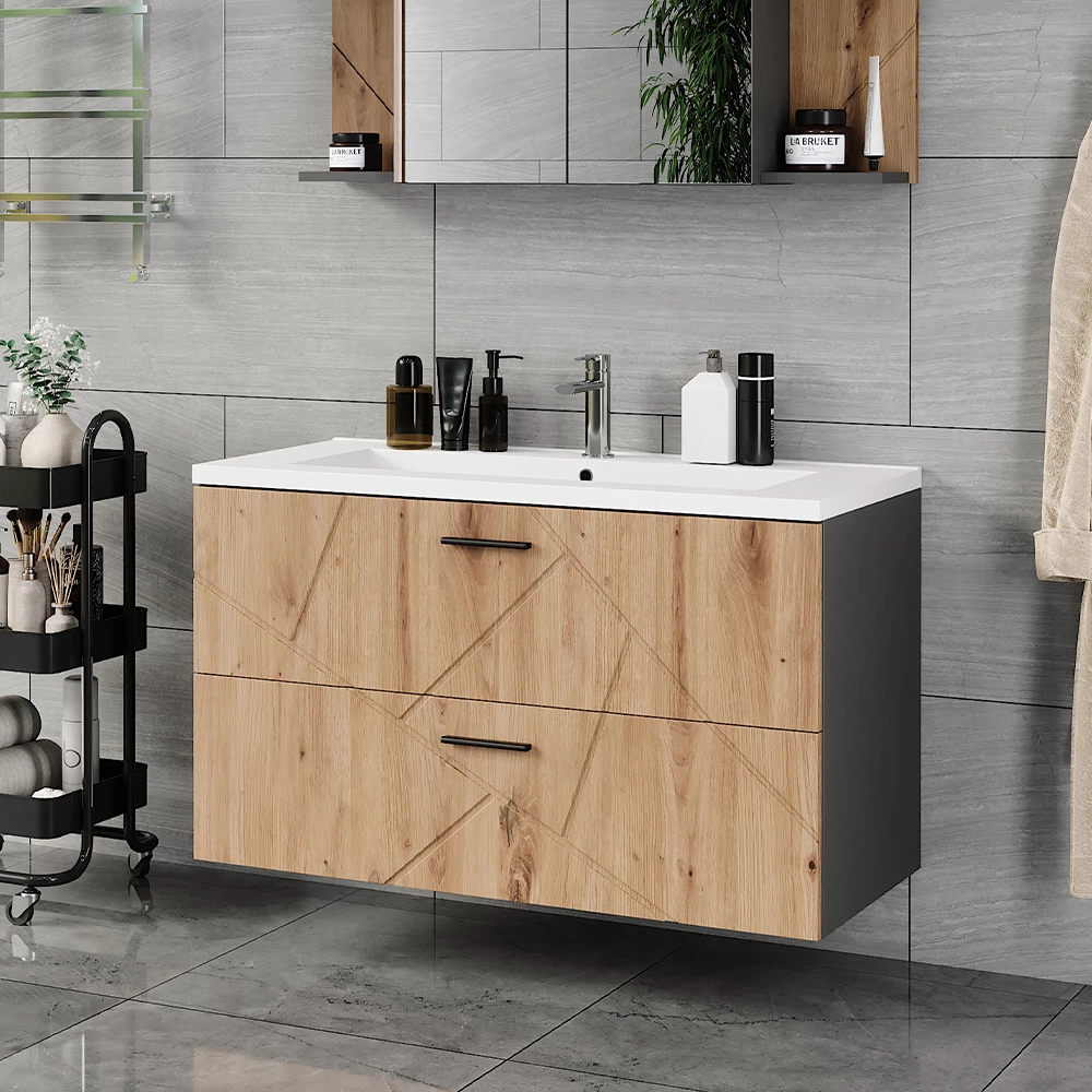 Waschbeckenunterschrank in Anthrazit/Artisan, dargestellt im Ambiente mit Dekoration