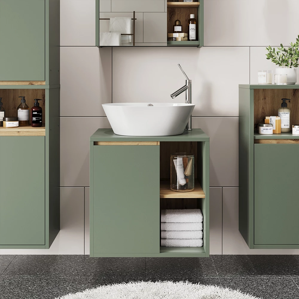 Meuble sous lavabo en Vert/Artisan, présenté dans un décor ambiant avec décoration