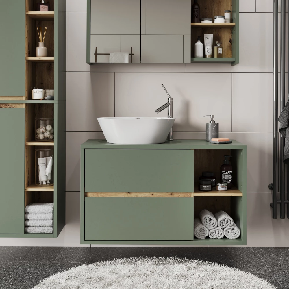 Waschbeckenunterschrank in Grün/Artisan, dargestellt im Ambiente mit Dekoration