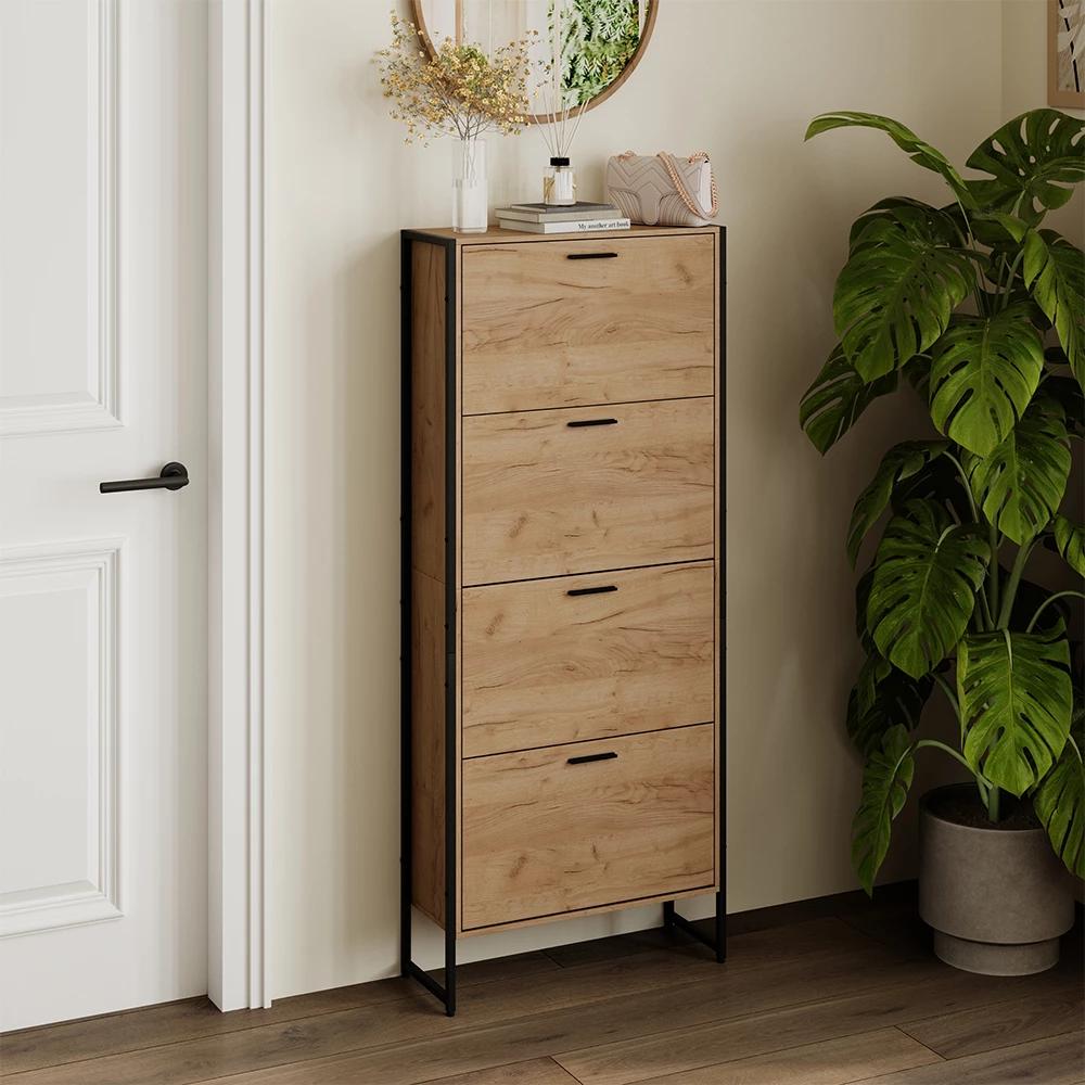 Skotipper i farven Goldkraft eg/sort, vist i et miljø med dekoration