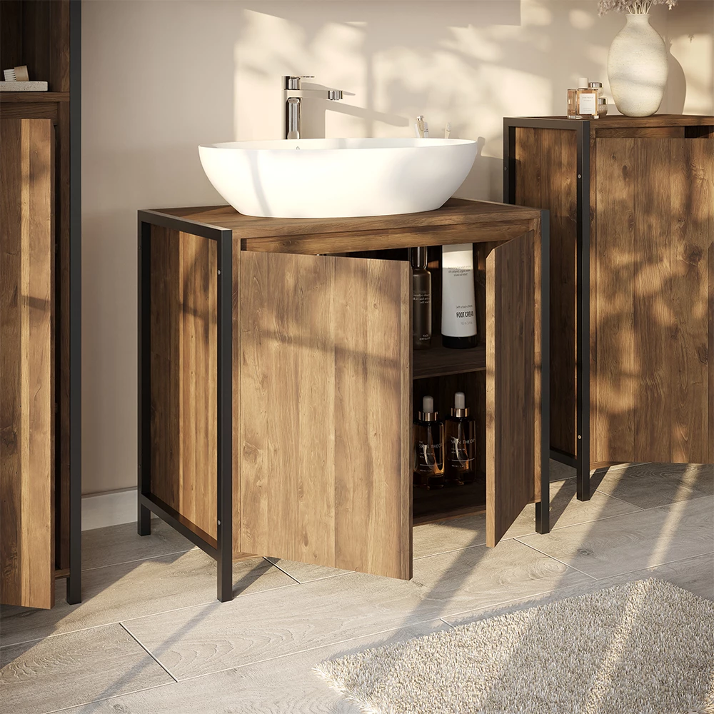 Nahaufnahme von Waschbeckenunterschrank in Eiche/Schwarz, zeigt Design- und Oberflächendetails