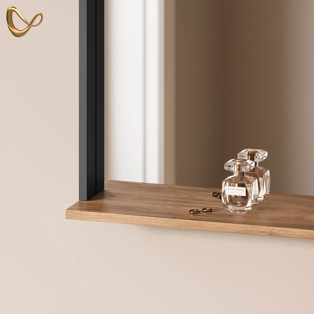 Nahaufnahme von Wandspiegel in Anthrazit/Goldkraft Eiche, zeigt Design- und Oberflächendetails