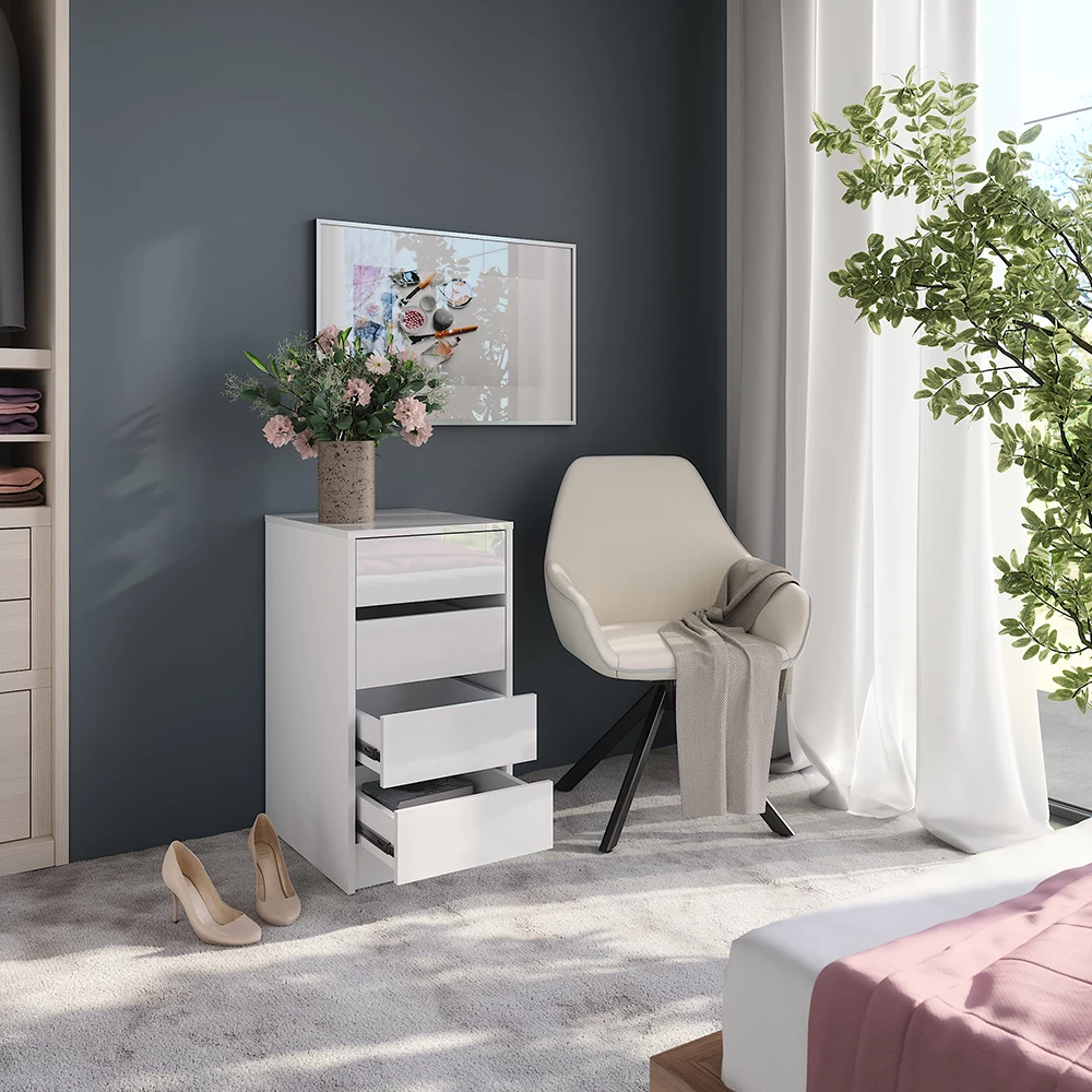 Nahaufnahme von Kommode in Weiß/Weiß Hochglanz, zeigt Design- und Oberflächendetails