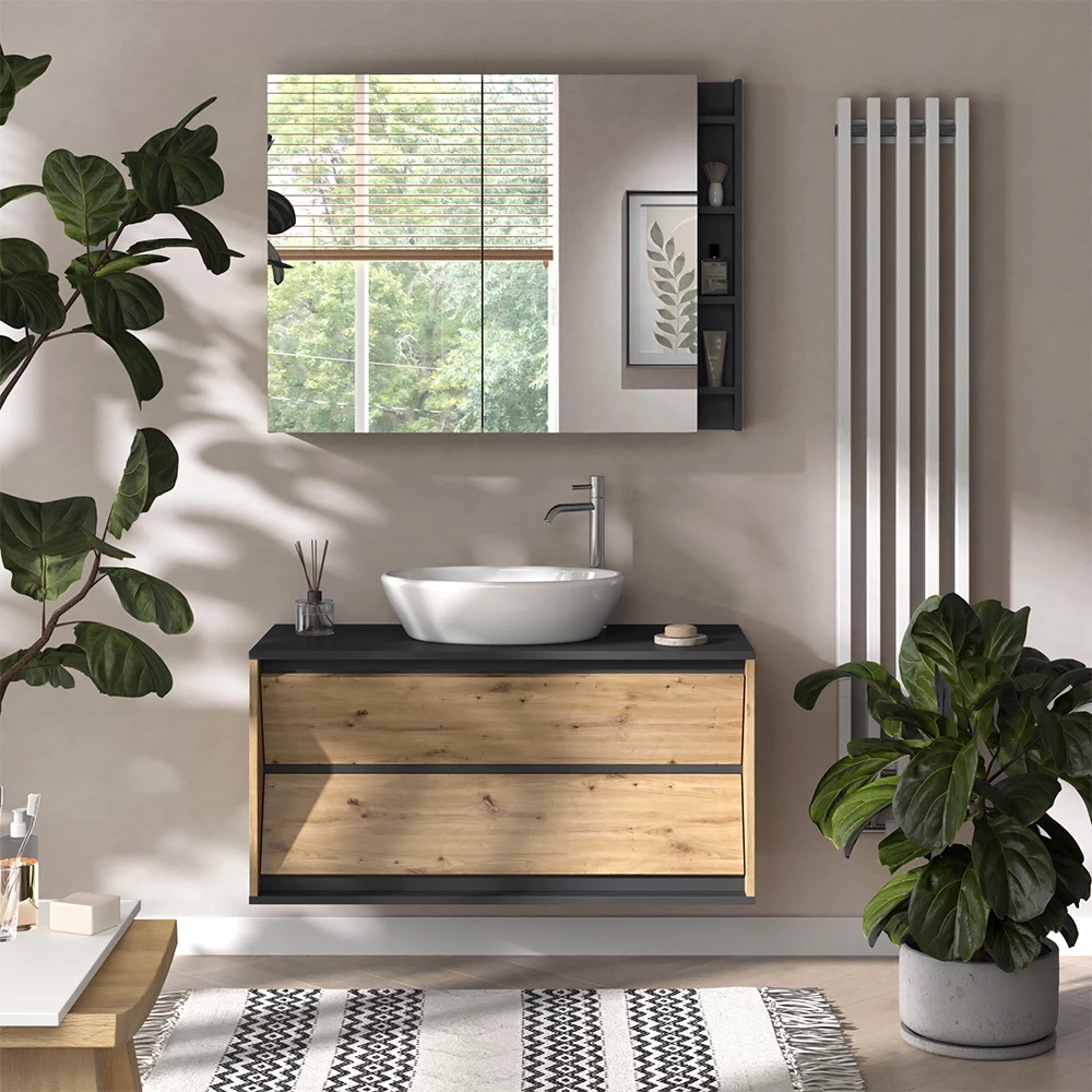 Wastafelonderkast in Antraciet/Artisan, getoond in een sfeervolle omgeving met decoratie