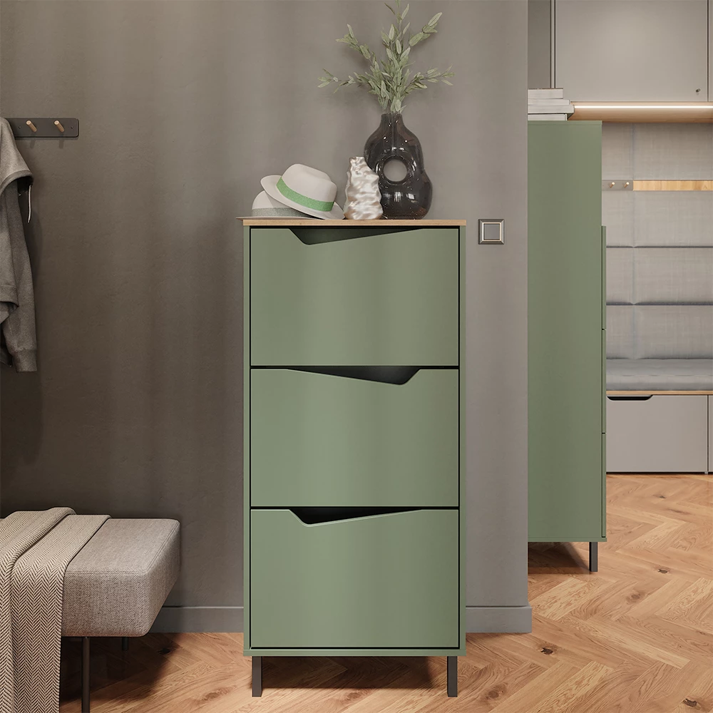 Skotipper i farven Grøn/Artisan, vist i et miljø med dekoration