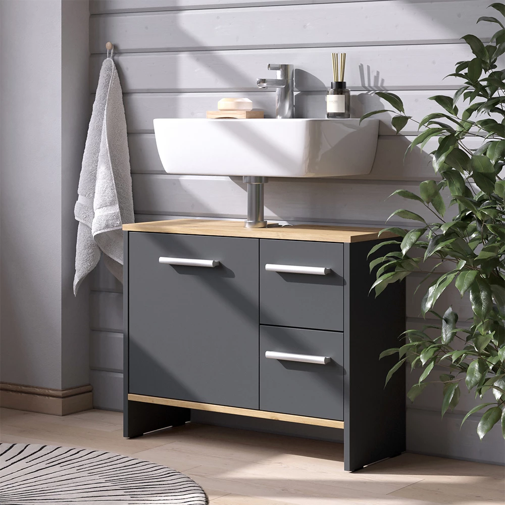 Waschbeckenunterschrank in Anthrazit, dargestellt im Ambiente mit Dekoration