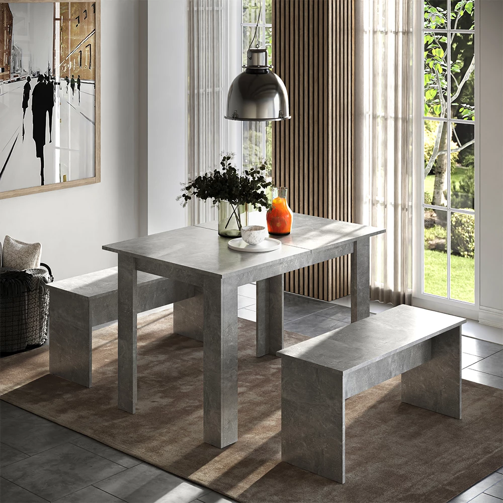 Dining table set in Concrete shown in ambient setting with decoration