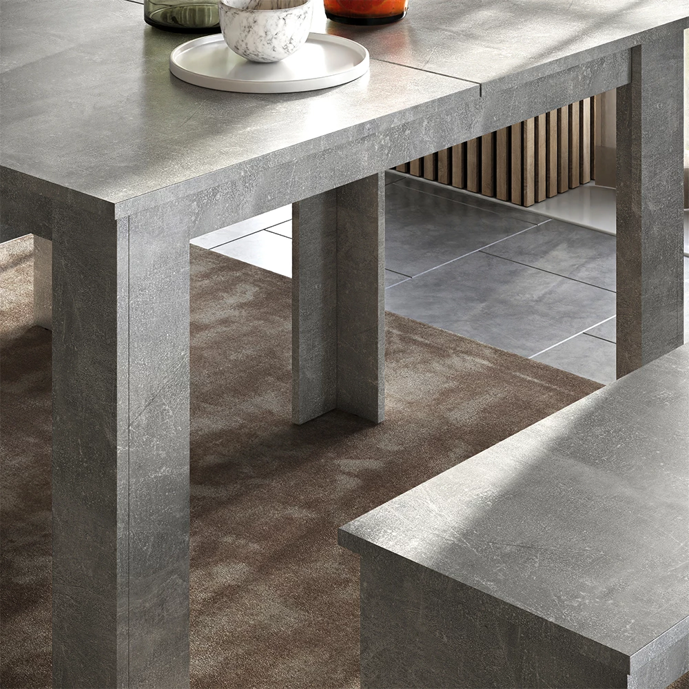 Close-up of Dining table set in Concrete, showing texture/details