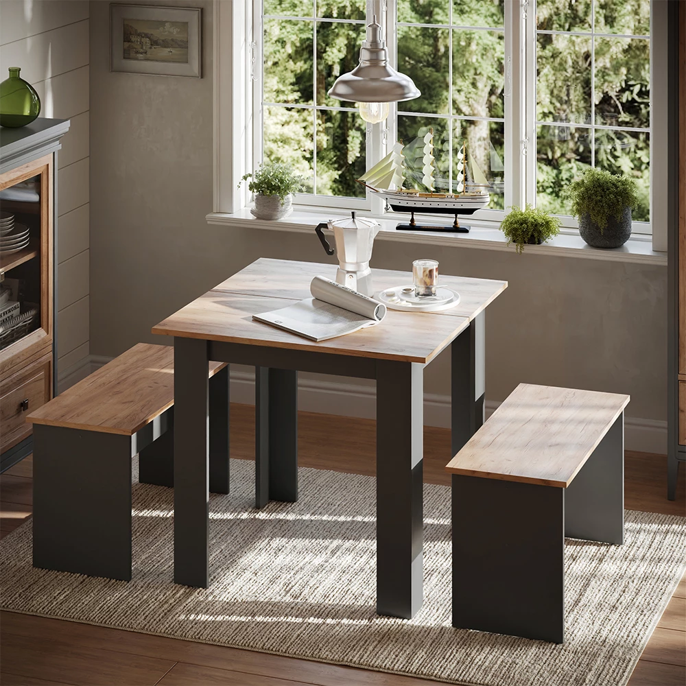 Dining table set in Anthracite/golden oak shown in ambient setting with decoration