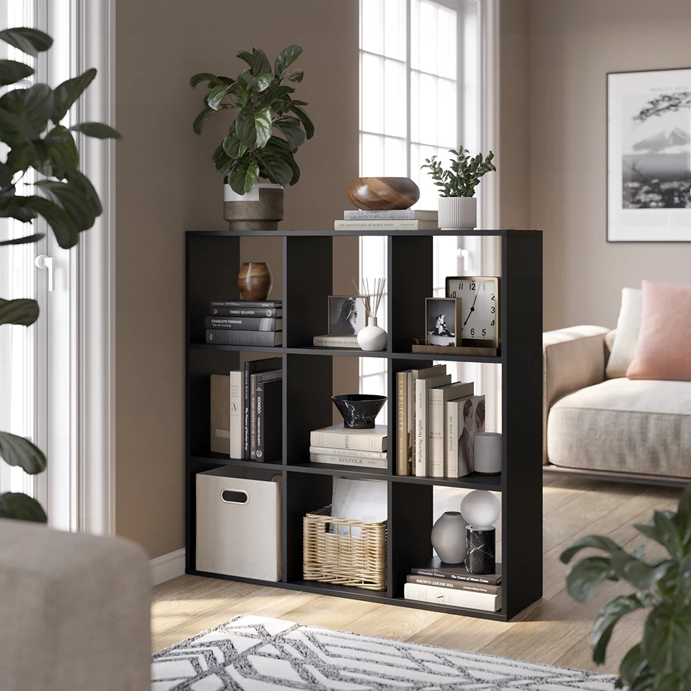 Room divider in Black shown in ambient setting with decoration