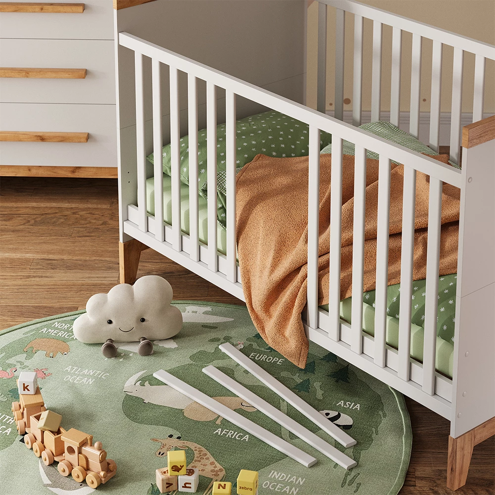 Nahaufnahme von Babybett in Weiß/Artisan, zeigt Textur/Details