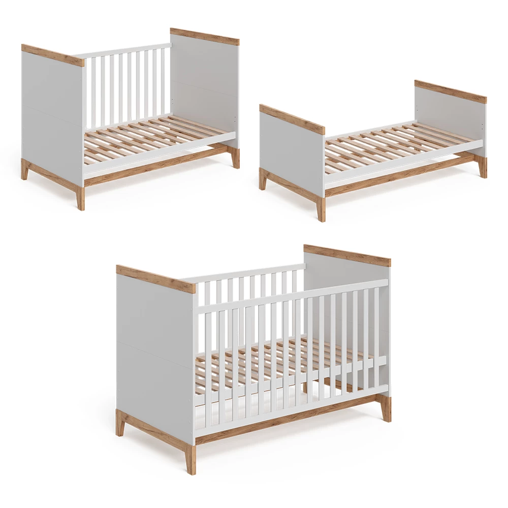 Nahaufnahme von Babybett in Weiß/Artisan, zeigt Design- und Oberflächendetails