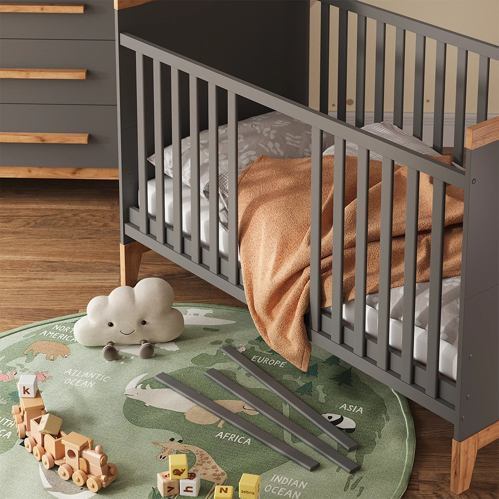 Nahaufnahme von Babybett in Grau/Artisan, zeigt Textur/Details