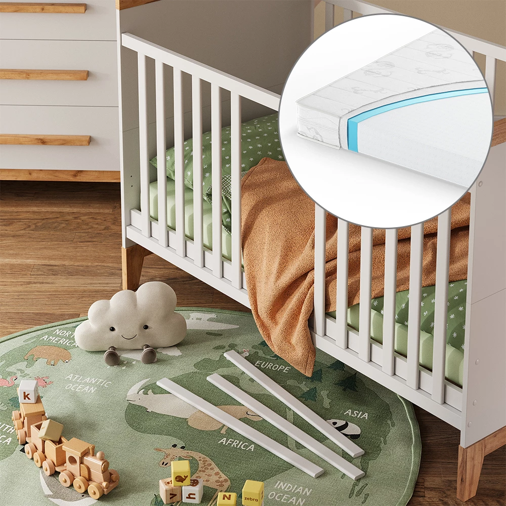 Nahaufnahme von Babybett in Weiß/Artisan, zeigt Textur/Details