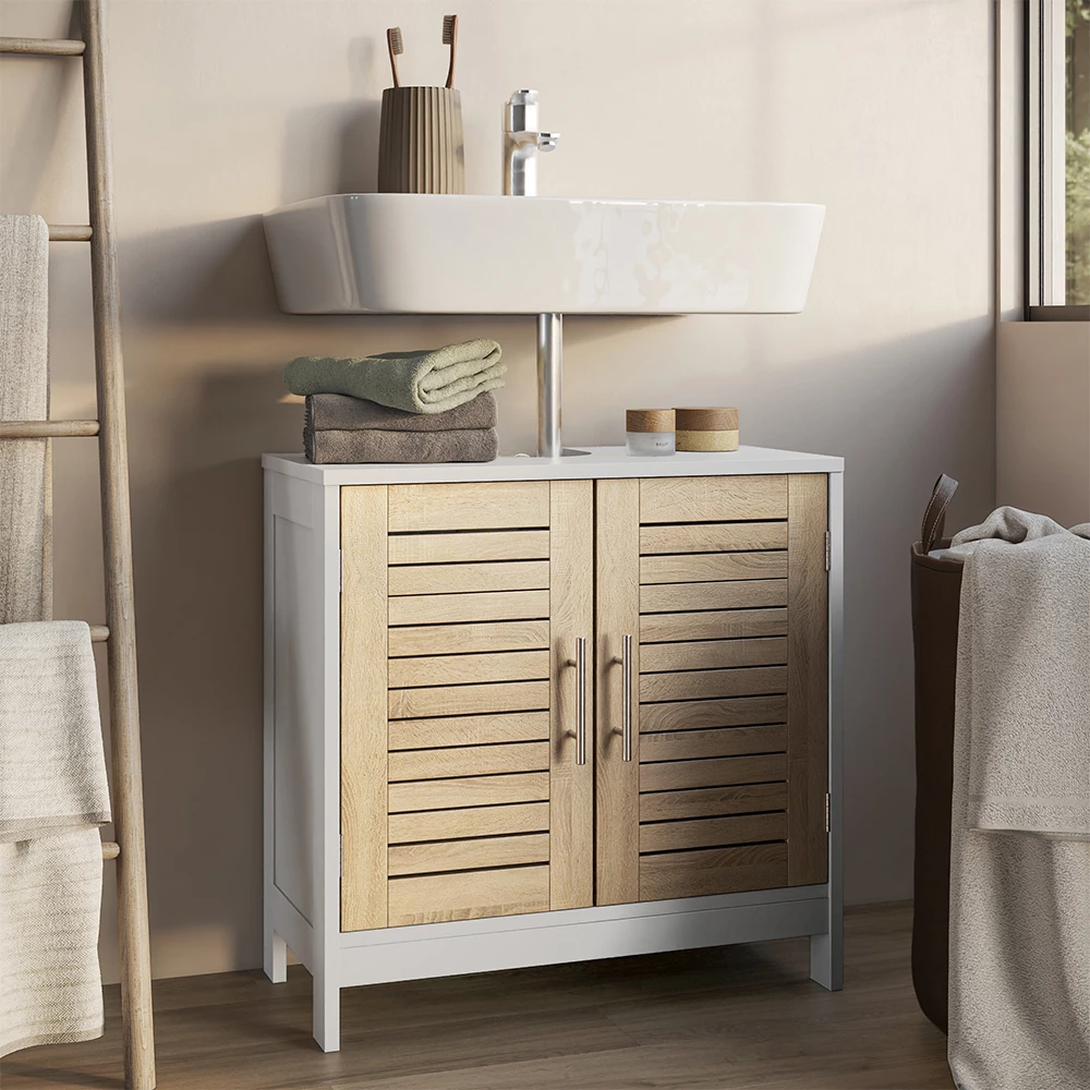 Meuble vasque simple en blanc/chêne, présenté dans un décor ambiant avec décoration