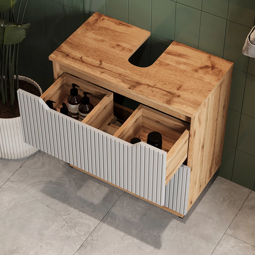 Nahaufnahme von Waschbeckenunterschrank in Grau, zeigt Textur/Details