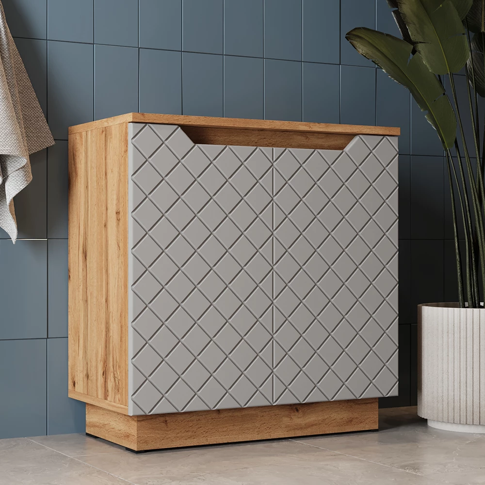 Waschbeckenunterschrank in Grau, dargestellt im Ambiente mit Dekoration