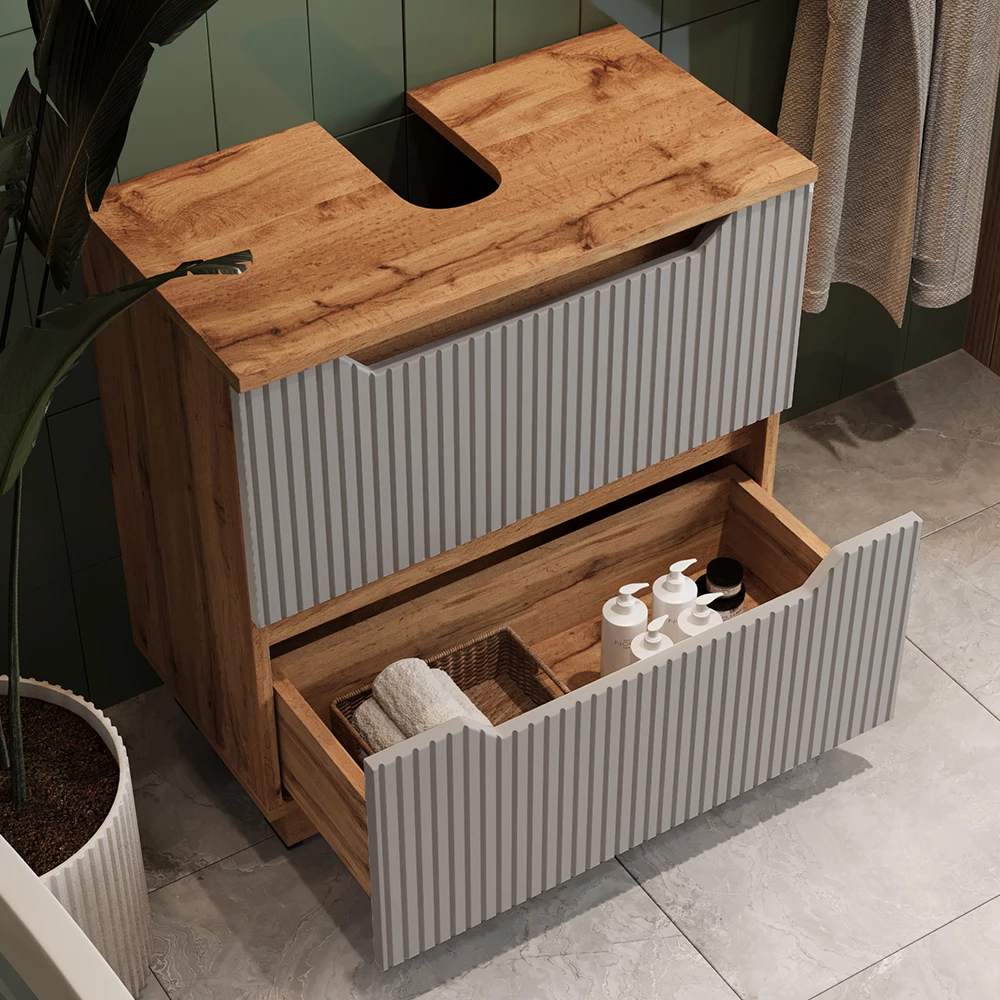 Nahaufnahme von Waschbeckenunterschrank in Grau, zeigt Design- und Oberflächendetails