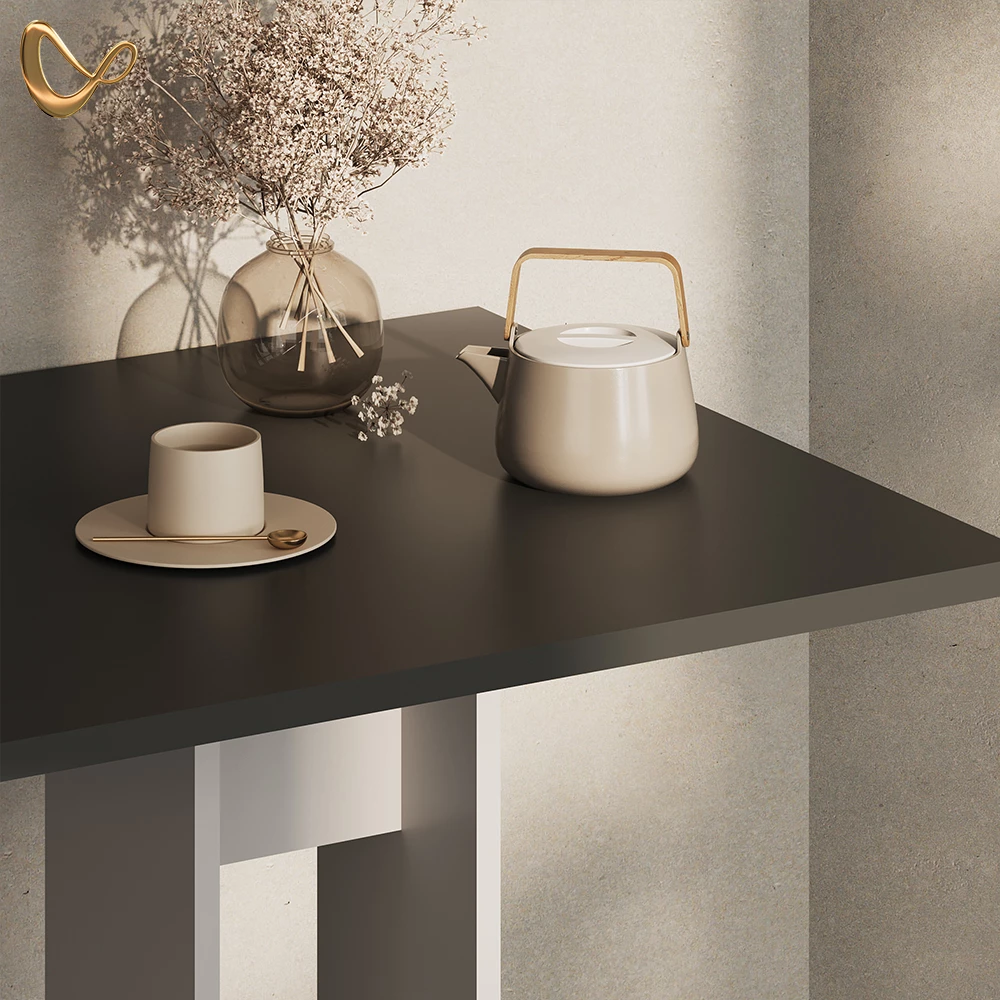 Nahaufnahme von Esstisch  in Weiß/Anthrazit, zeigt Design- und Oberflächendetails