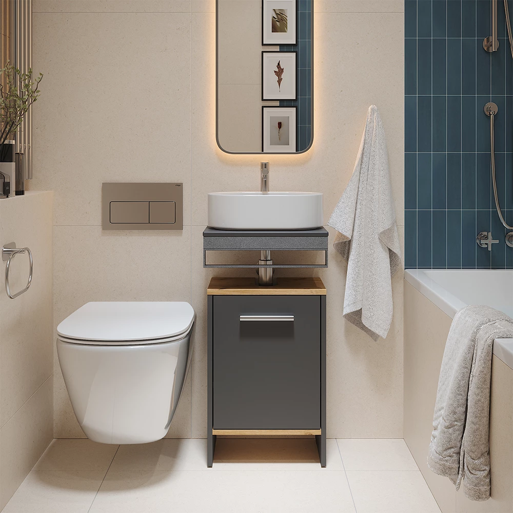 Waschbeckenunterschrank in Anthrazit/Goldkraft Eiche, dargestellt im Ambiente mit Dekoration