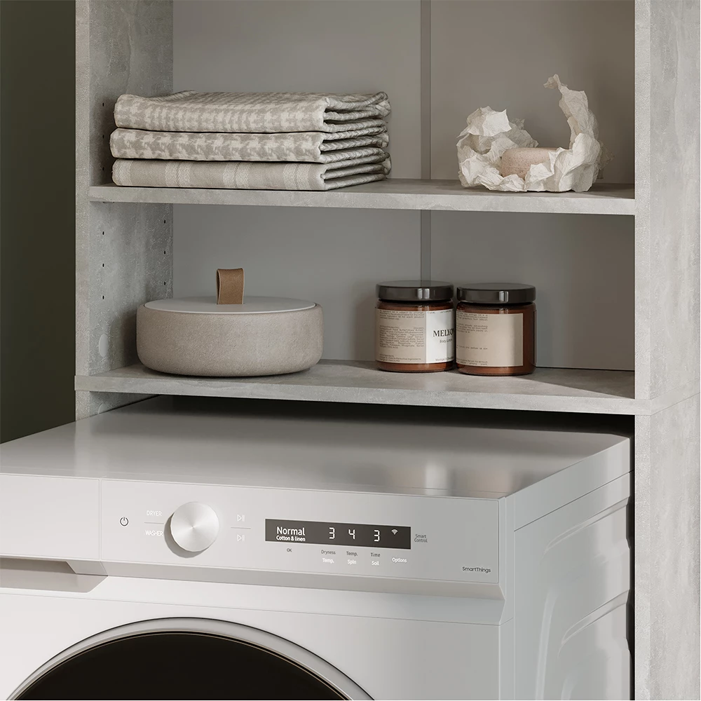 Nahaufnahme von Waschmaschinenschrank in Beton, zeigt Design- und Oberflächendetails